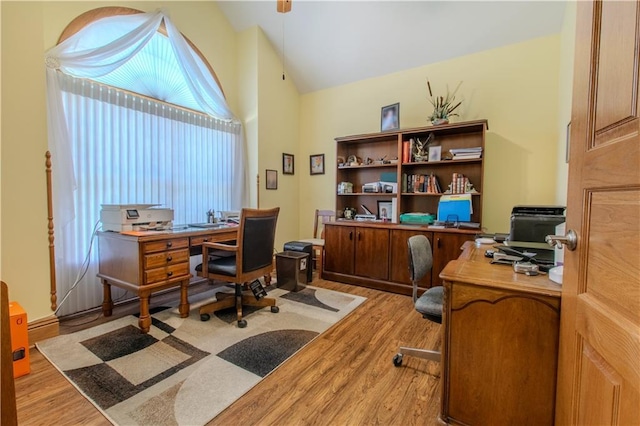 22604 Vincent St, Peculiar, MO 64078 - office area with light wood finished floors and high vaulted ceiling