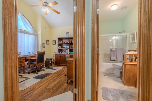 22604 Vincent St, Peculiar, MO 64078 - home office featuring ceiling fan, wood finished floors, and lofted ceiling