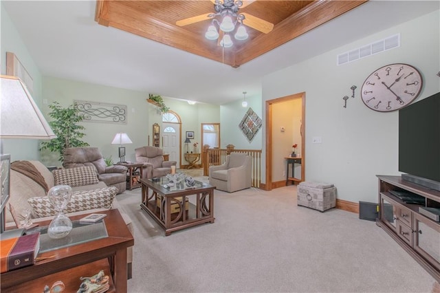 22604 Vincent St, Peculiar, MO 64078 - living area featuring a raised ceiling, ceiling fan, and carpet floors