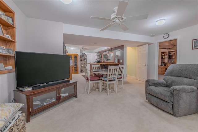 22604 Vincent St, Peculiar, MO 64078 - living area featuring ceiling fan and light carpet