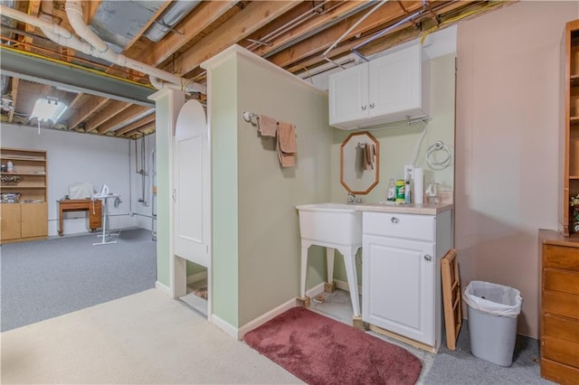 22604 Vincent St, Peculiar, MO 64078 - unfinished basement featuring light carpet and baseboards