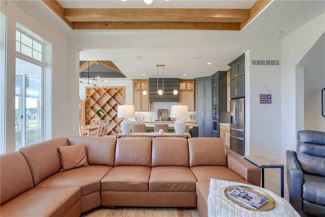 17325 Bradshaw St, Overland Park, KS 66221 - living room with beam ceiling and recessed lighting
