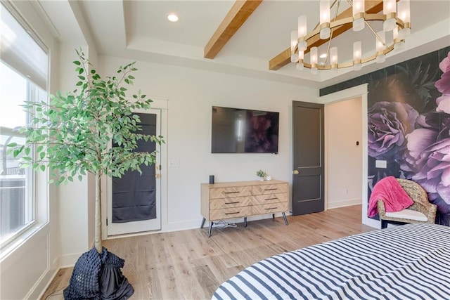 17325 Bradshaw St, Overland Park, KS 66221 - bedroom with a chandelier, light wood-style floors, and beam ceiling