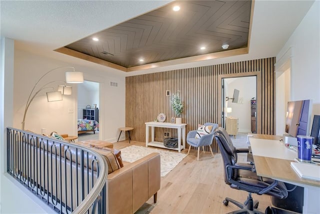 17325 Bradshaw St, Overland Park, KS 66221 - office featuring a tray ceiling, light wood-style floors, and recessed lighting