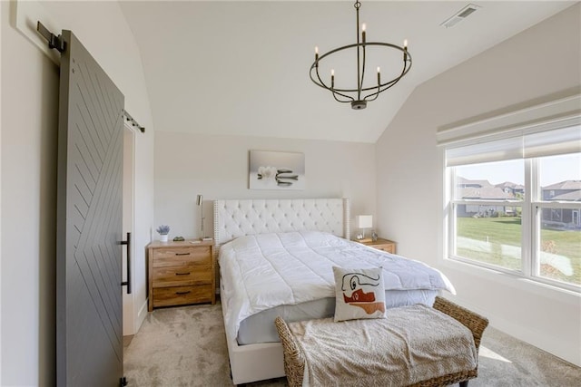 17325 Bradshaw St, Overland Park, KS 66221 - bedroom featuring light carpet, vaulted ceiling, a chandelier, and a barn door