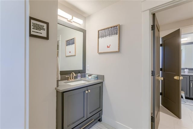 17325 Bradshaw St, Overland Park, KS 66221 - bathroom featuring vanity and tile patterned floors
