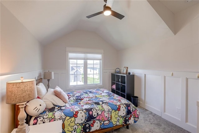 17325 Bradshaw St, Overland Park, KS 66221 - carpeted bedroom featuring a wainscoted wall, lofted ceiling, and a ceiling fan