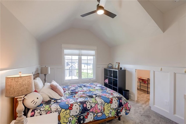 17325 Bradshaw St, Overland Park, KS 66221 - carpeted bedroom featuring wainscoting, lofted ceiling, and ceiling fan