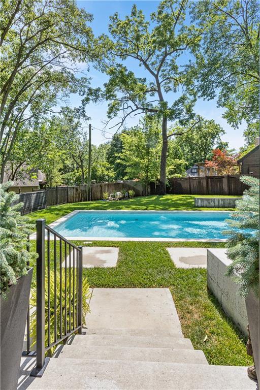 5500 Mission Rd, Fairway, KS 66205 - view of swimming pool featuring a fenced backyard and a patio