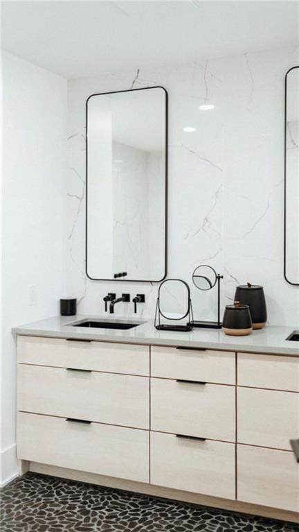 5500 Mission Rd, Fairway, KS 66205 - bathroom featuring double vanity and baseboards