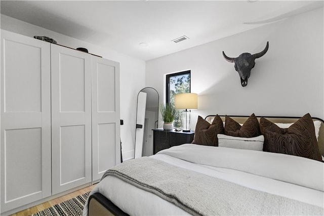 5500 Mission Rd, Fairway, KS 66205 - bedroom featuring light wood-type flooring