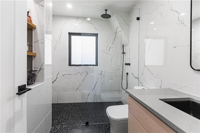5500 Mission Rd, Fairway, KS 66205 - bathroom with vanity, a marble finish shower, and tile walls