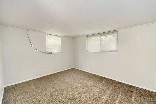 818 N Wigwam Trl, Independence, MO 64056 - carpeted empty room featuring baseboards