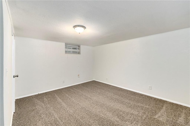 818 N Wigwam Trl, Independence, MO 64056 - unfurnished room with dark carpet and a textured ceiling