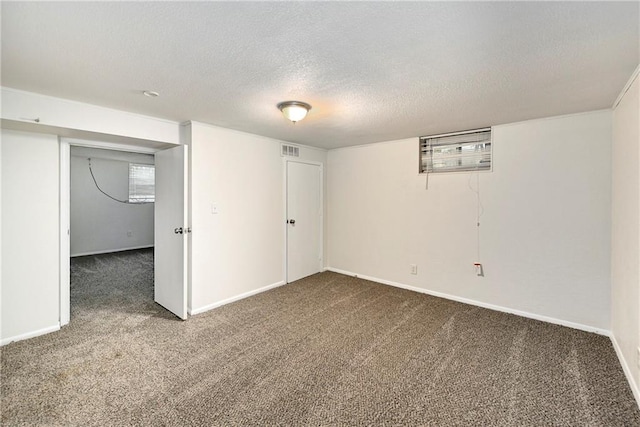 818 N Wigwam Trl, Independence, MO 64056 - basement featuring carpet flooring, a textured ceiling, and healthy amount of natural light