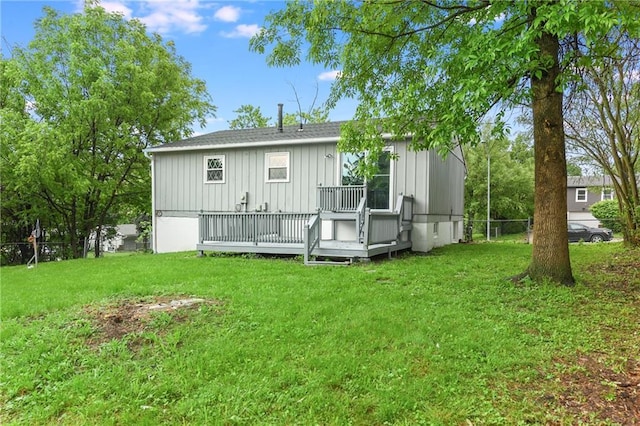 818 N Wigwam Trl, Independence, MO 64056 - rear view of property featuring board and batten siding and a wooden deck