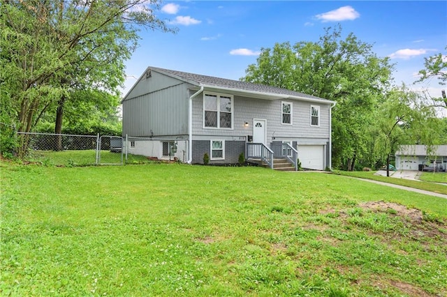 818 N Wigwam Trl, Independence, MO 64056 - back of house with an attached garage and a gate