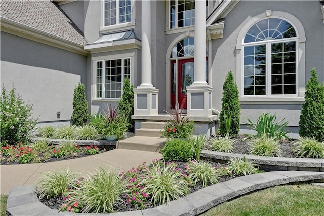 12333 Westgate St, Overland Park, KS 66213 - doorway to property with stucco siding