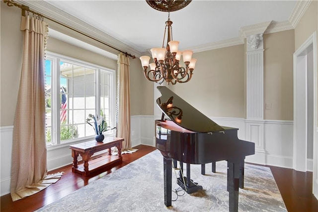 12333 Westgate St, Overland Park, KS 66213 - living area with a chandelier, crown molding, wainscoting, and wood finished floors