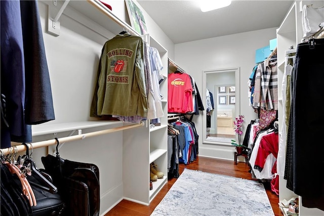 12333 Westgate St, Overland Park, KS 66213 - spacious closet featuring wood finished floors