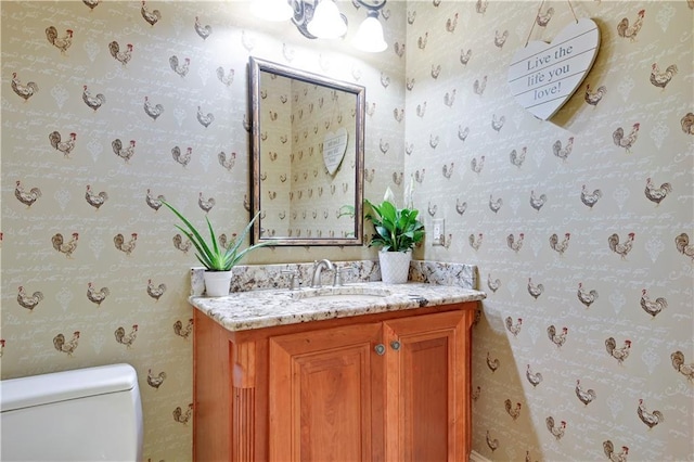12333 Westgate St, Overland Park, KS 66213 - half bathroom with vanity and wallpapered walls