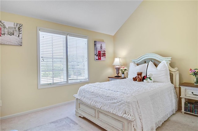 12333 Westgate St, Overland Park, KS 66213 - bedroom featuring light colored carpet, multiple windows, and vaulted ceiling