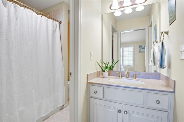 12333 Westgate St, Overland Park, KS 66213 - bathroom with vanity, tile patterned flooring, and a shower with shower curtain