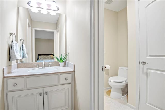 12333 Westgate St, Overland Park, KS 66213 - bathroom featuring vanity, tile patterned flooring, and ensuite bathroom