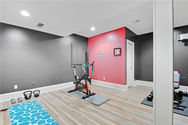 12333 Westgate St, Overland Park, KS 66213 - workout room featuring light wood-type flooring and recessed lighting