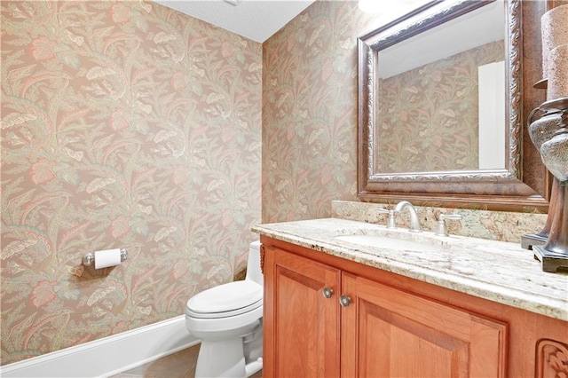 12333 Westgate St, Overland Park, KS 66213 - half bathroom featuring vanity and wallpapered walls