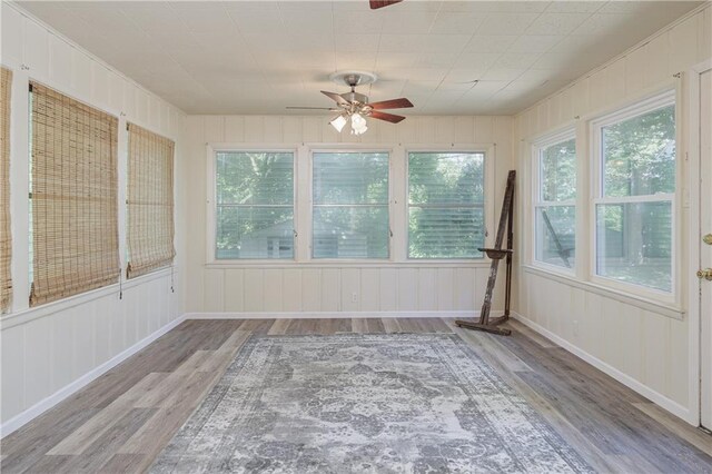 2010 Eugene Field Ave, Saint Joseph, MO 64505 - unfurnished sunroom with wood finished floors and plenty of natural light