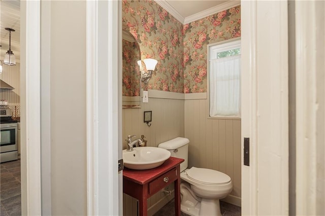 2010 Eugene Field Ave, Saint Joseph, MO 64505 - bathroom with a wainscoted wall, vanity, wallpapered walls, and crown molding