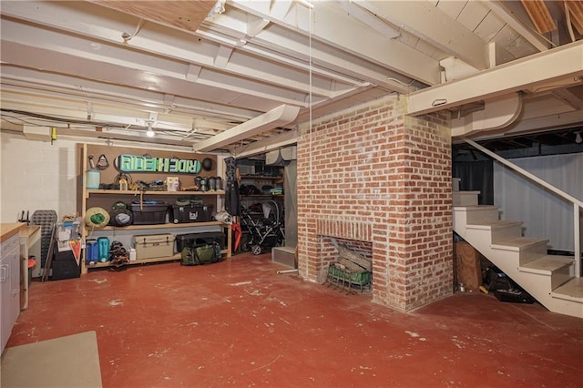 2010 Eugene Field Ave, Saint Joseph, MO 64505 - basement with stairway and a brick fireplace