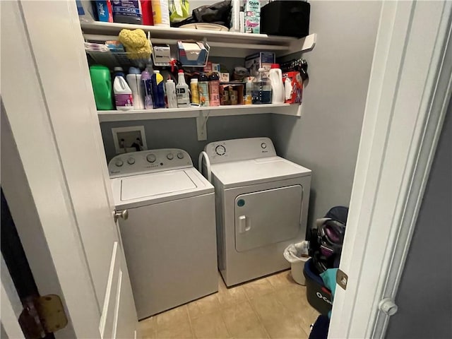 17540 W 159th Ct, Olathe, KS 66062 - laundry room featuring separate washer and dryer and light tile patterned flooring