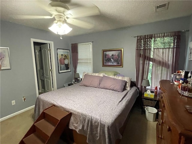 17540 W 159th Ct, Olathe, KS 66062 - bedroom featuring carpet flooring, a textured ceiling, and ceiling fan