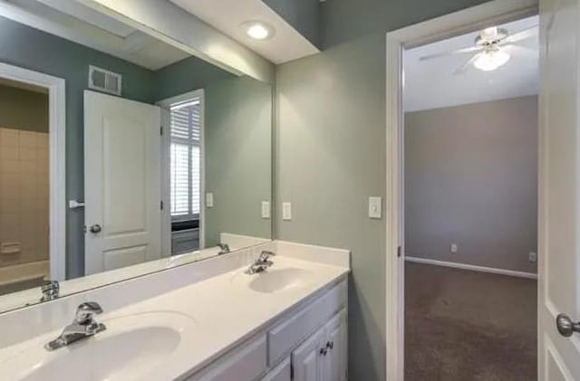 14301 Beverly St, Overland Park, KS 66223 - bathroom with double vanity and ceiling fan