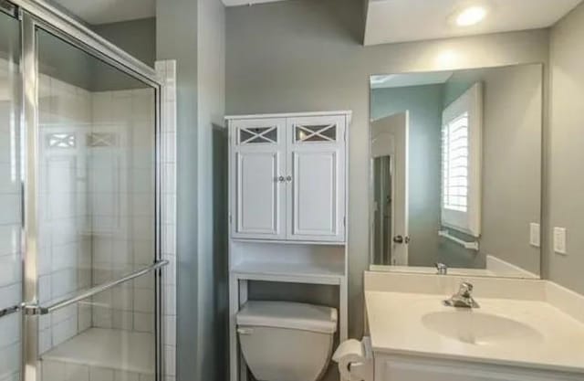 14301 Beverly St, Overland Park, KS 66223 - bathroom with vanity and a shower stall