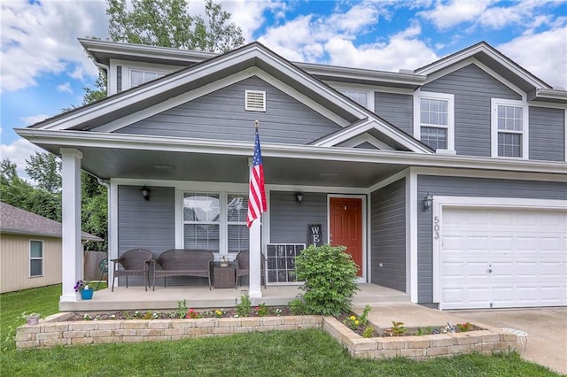 503 SW Creek Ridge Dr, Grain Valley, MO 64029 - view of front of house featuring a porch and an attached garage