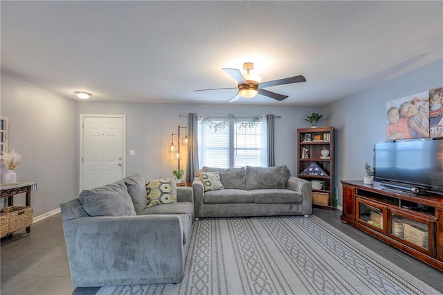 503 SW Creek Ridge Dr, Grain Valley, MO 64029 - living area featuring ceiling fan and baseboards
