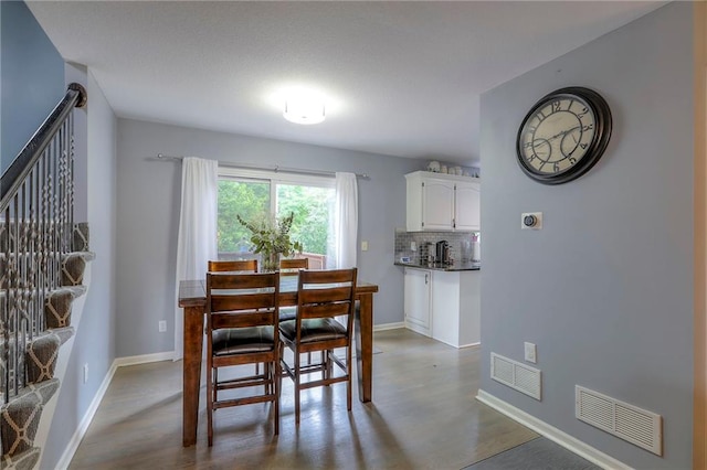 503 SW Creek Ridge Dr, Grain Valley, MO 64029 - dining space with wood finished floors