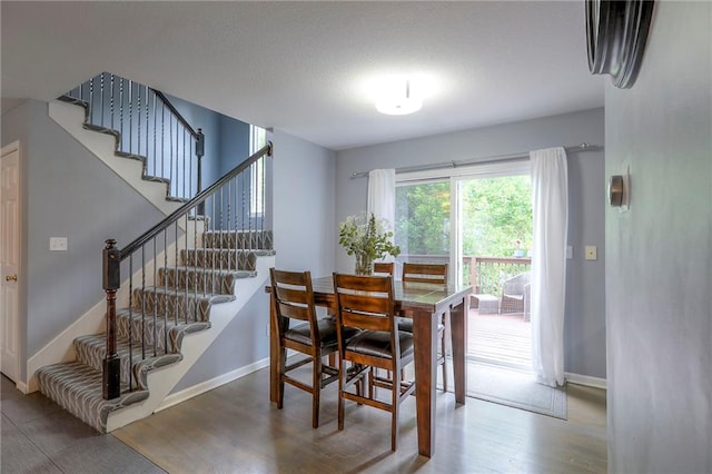 503 SW Creek Ridge Dr, Grain Valley, MO 64029 - dining room with wood finished floors and stairway