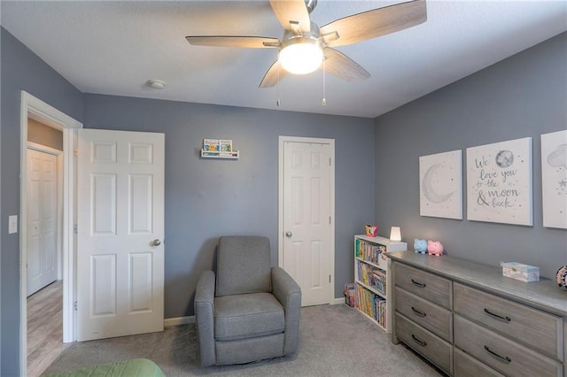 503 SW Creek Ridge Dr, Grain Valley, MO 64029 - sitting room with a ceiling fan and light colored carpet