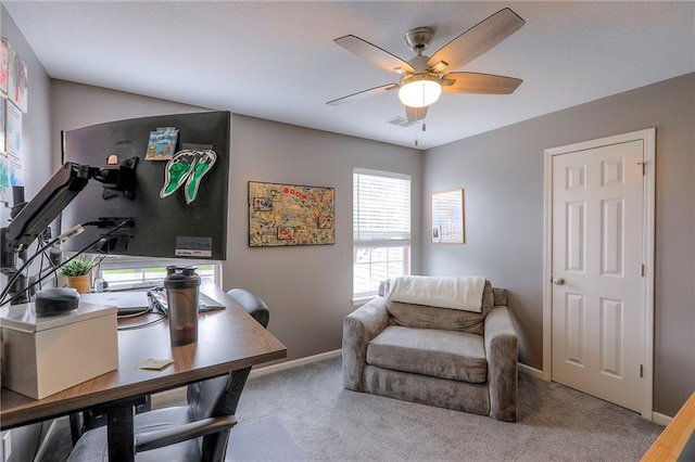 503 SW Creek Ridge Dr, Grain Valley, MO 64029 - carpeted home office featuring a ceiling fan and healthy amount of natural light