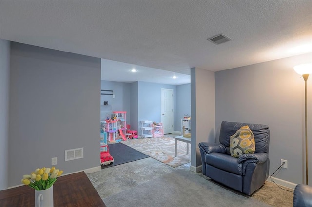 503 SW Creek Ridge Dr, Grain Valley, MO 64029 - playroom with recessed lighting and a textured ceiling
