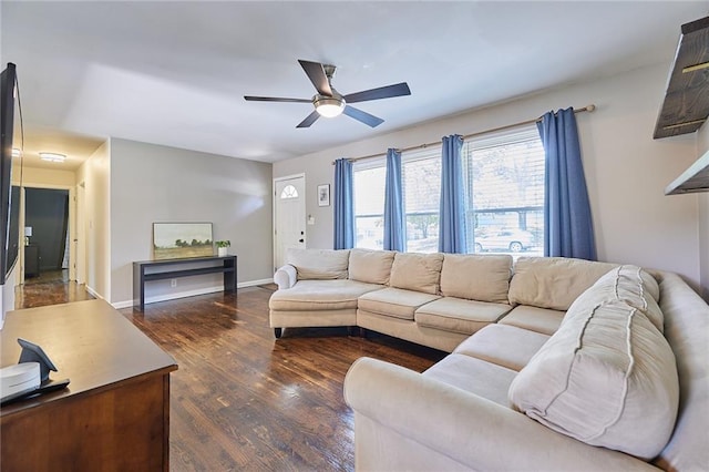 7725 Cleveland Ave, Kansas City, KS 66109 - living room with dark wood-style flooring and a ceiling fan
