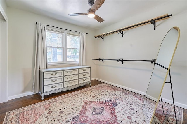 7725 Cleveland Ave, Kansas City, KS 66109 - spacious closet featuring a ceiling fan and dark wood-style floors