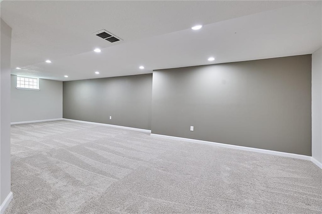 7725 Cleveland Ave, Kansas City, KS 66109 - below grade area with carpet and recessed lighting