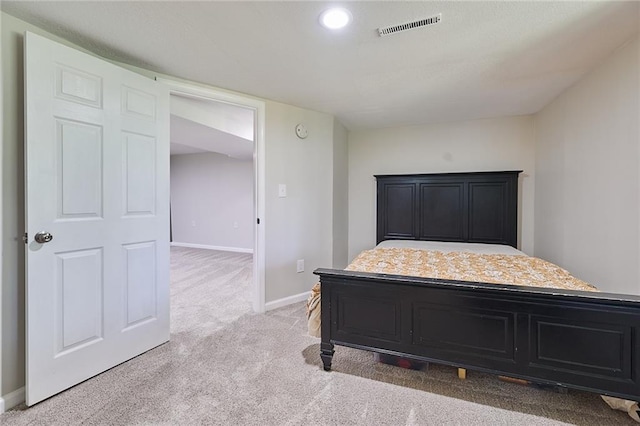 7725 Cleveland Ave, Kansas City, KS 66109 - bedroom with light colored carpet and baseboards