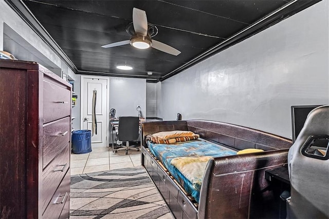 3021 Topping Ave, Kansas City, MO 64129 - bedroom featuring tile patterned floors, ornamental molding, and a ceiling fan