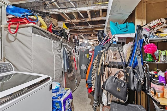 3021 Topping Ave, Kansas City, MO 64129 - storage room with washer / clothes dryer and water heater